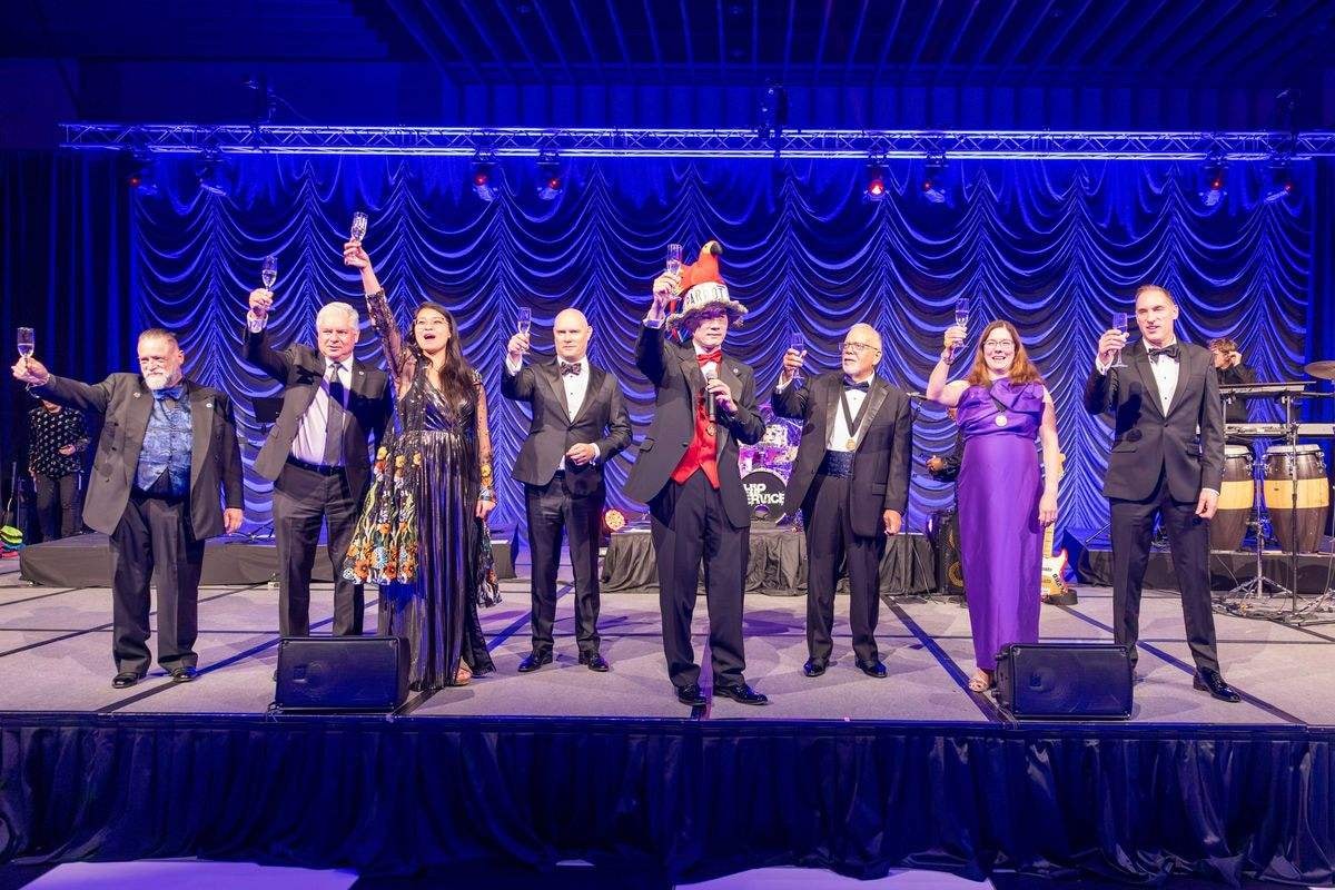 Champagne toast on stage at the CMA Presidential Gala