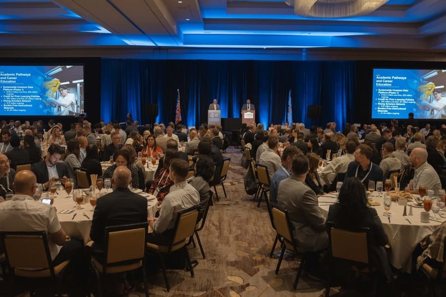 Packed ballroom general session at the Community College Facility Coalition conference — corporate event photography by Michael Pegram