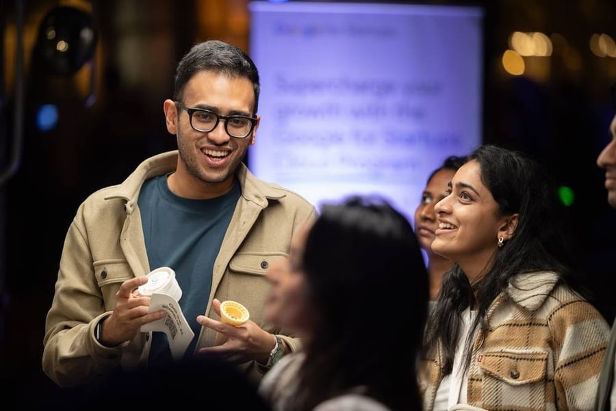 Attendees chatting at a Google for Startups Cloud event in San Francisco — corporate event photography by Michael Pegram