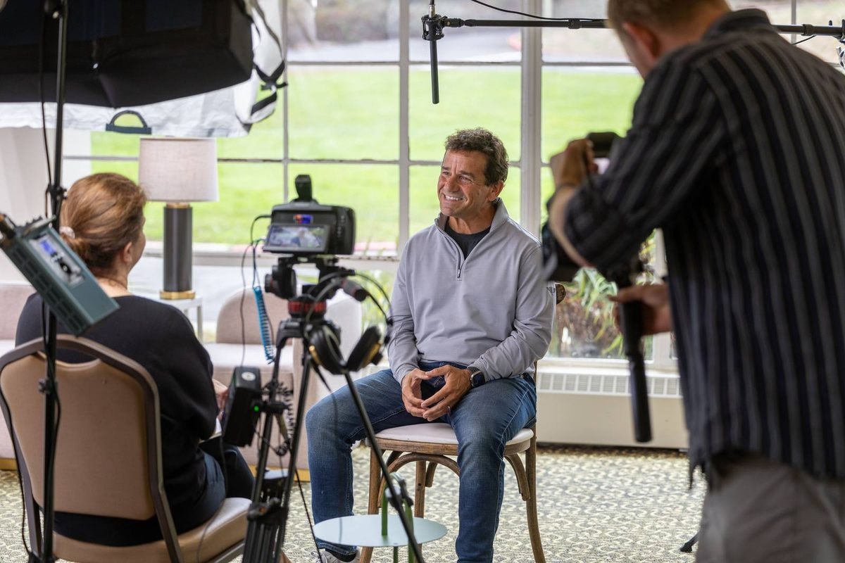 Behind the scenes of a video interview being filmed at a Bay Area conference — corporate event photography by Michael Pegram