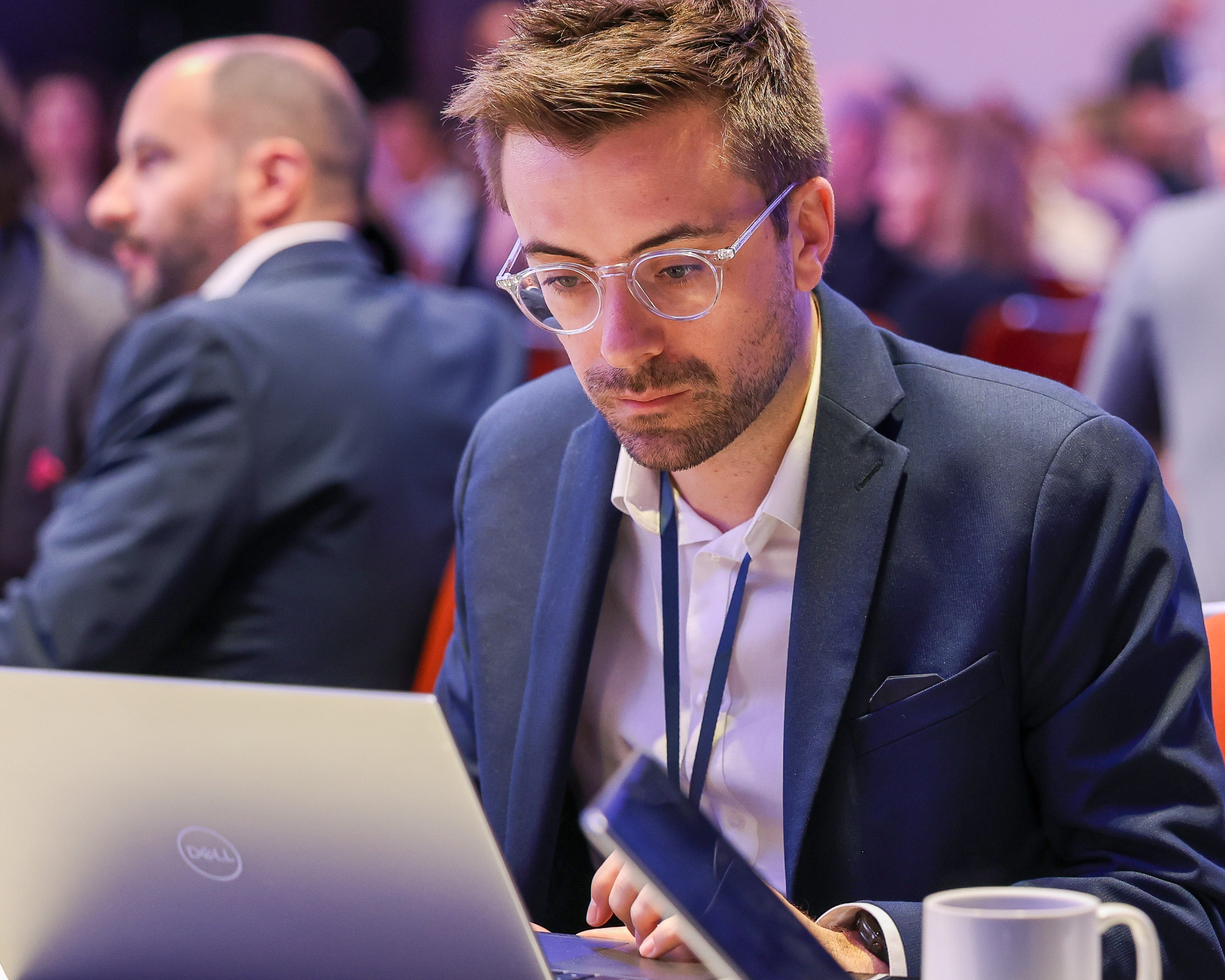 Man working on laptop at conference — Michael Pegram Photography