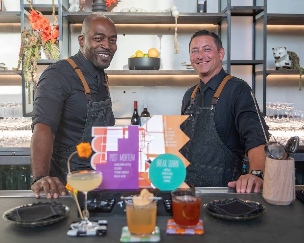 Bartenders serving signature cocktails at a corporate event — event photography by Michael Pegram