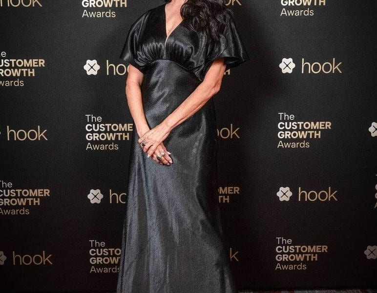 Guest in a satin gown on the red carpet at the Hook Customer Growth Awards — event photography by Michael Pegram
