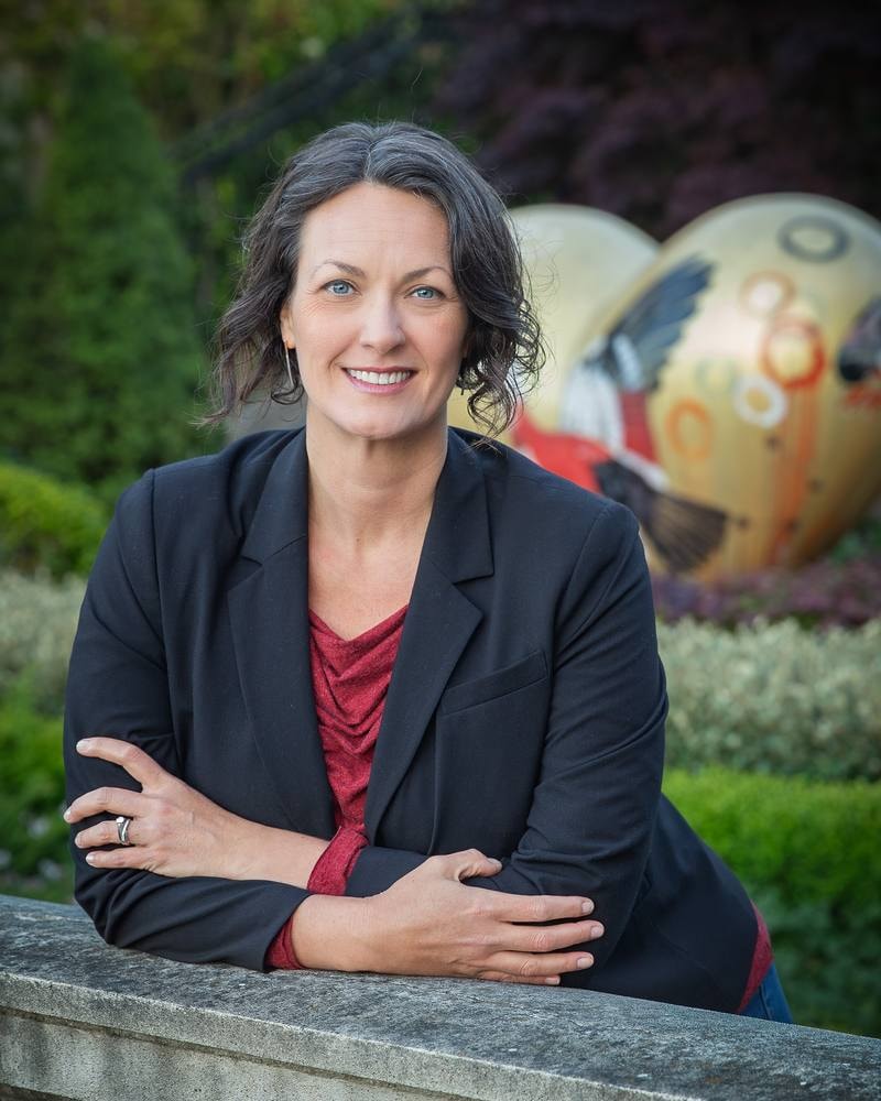 Outdoor executive headshot of a woman in a business blazer — San Francisco headshot by Michael Pegram